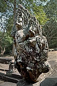 Banteay Kdei temple - cruciform terrace with naga-balustrades and lions before east gopura III.